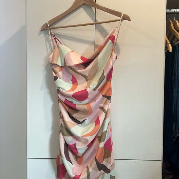 Cocktail dress. NWT. Unique cut and angles. So flattering. - Picture 1 of 7